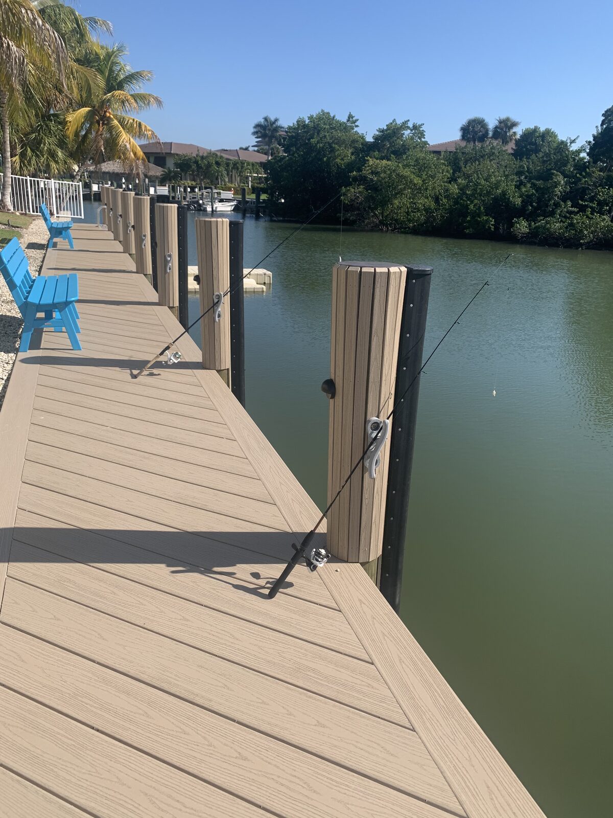 Weardeck decking and piling strips, PVC benching for seating, and each piling finished with a cleat and bumper.